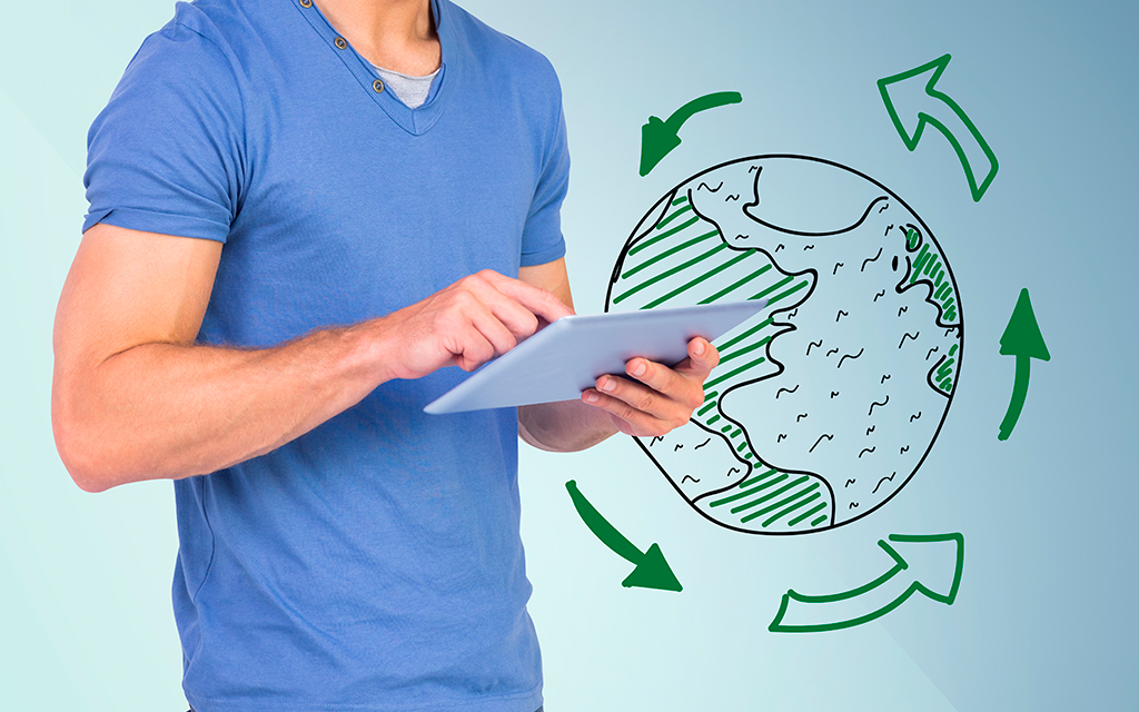 Man using a tablet with a hand-drawn globe and green recycling arrows in the background